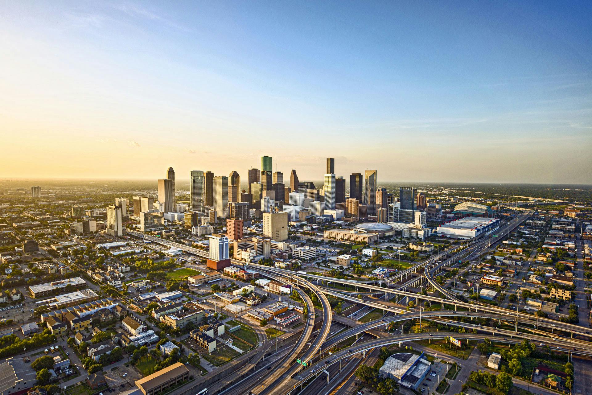 Aerial shot of the downtown Houston skyline at dusk