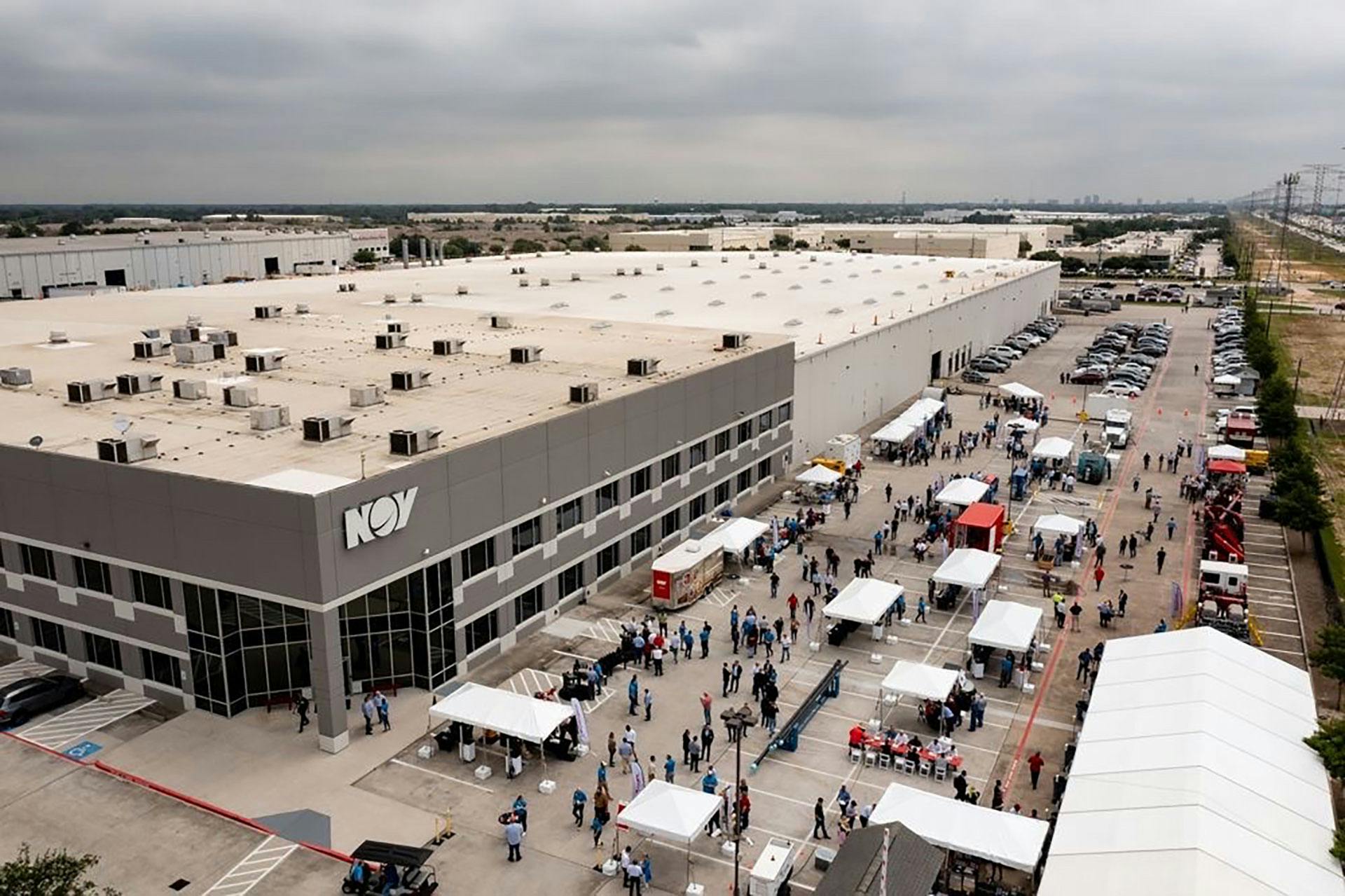 Aerial shot of tents and people outside of an NOV facility during the customer showcase