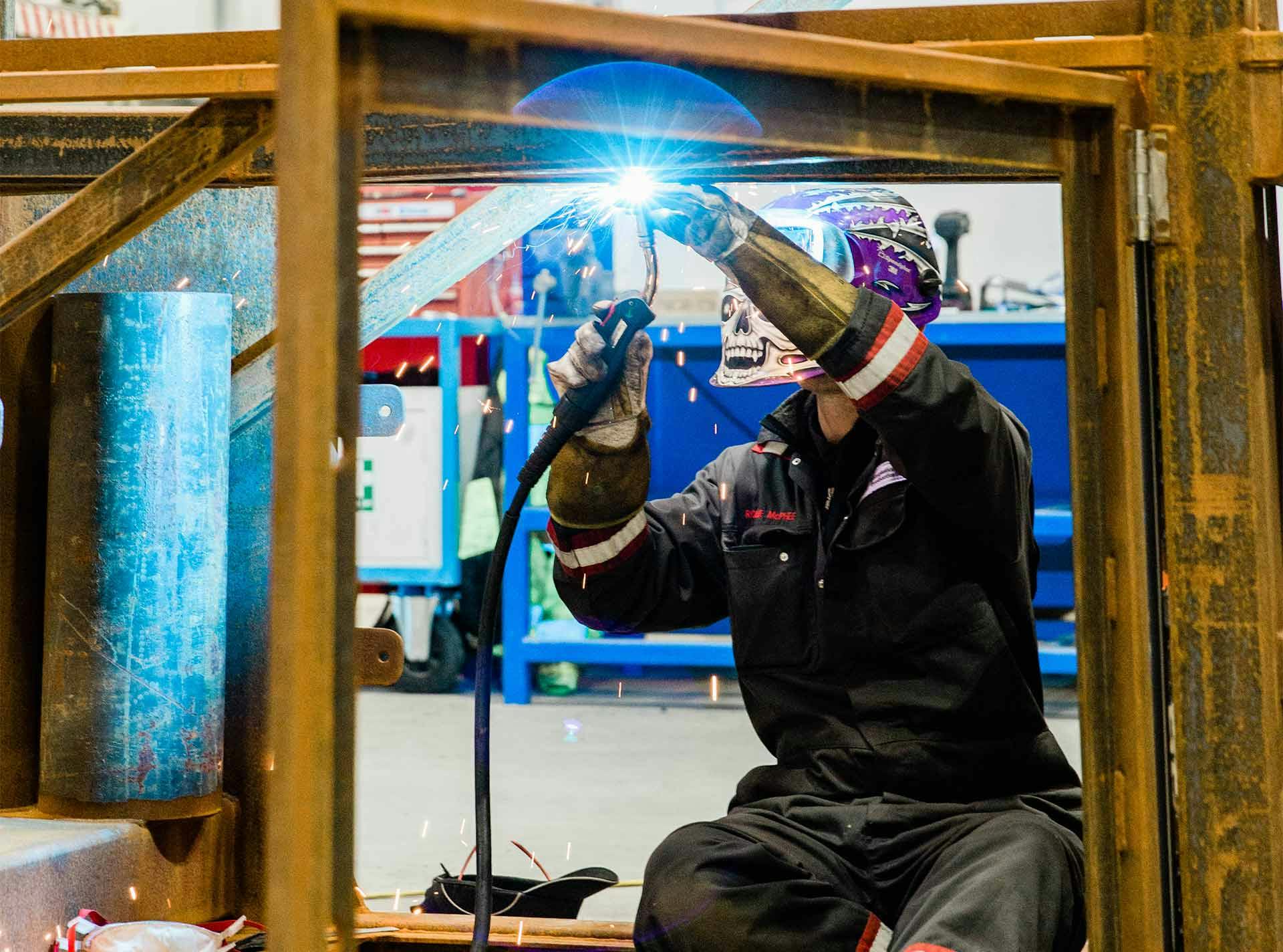 Image of a man welding