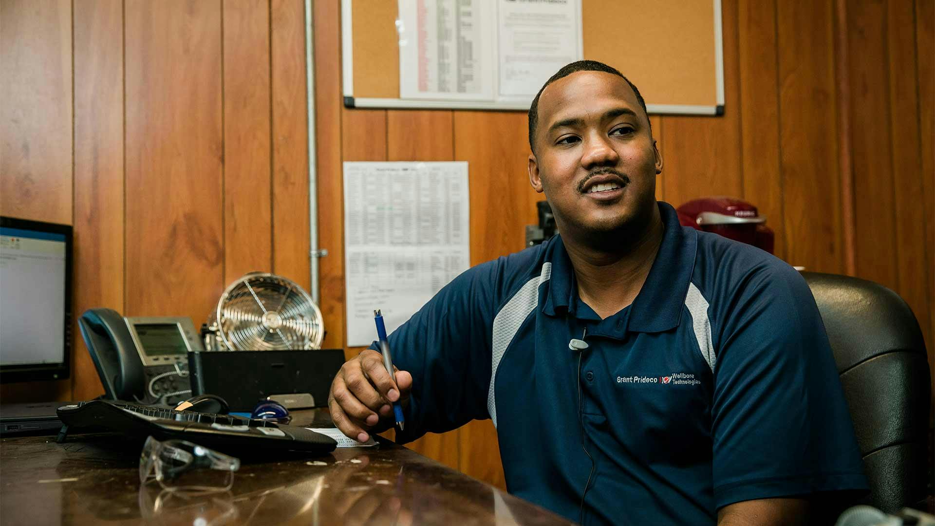 Turn and Bore supervisor II, Broddrick, in his office at Grant Prideco facility located in Navasota, TX