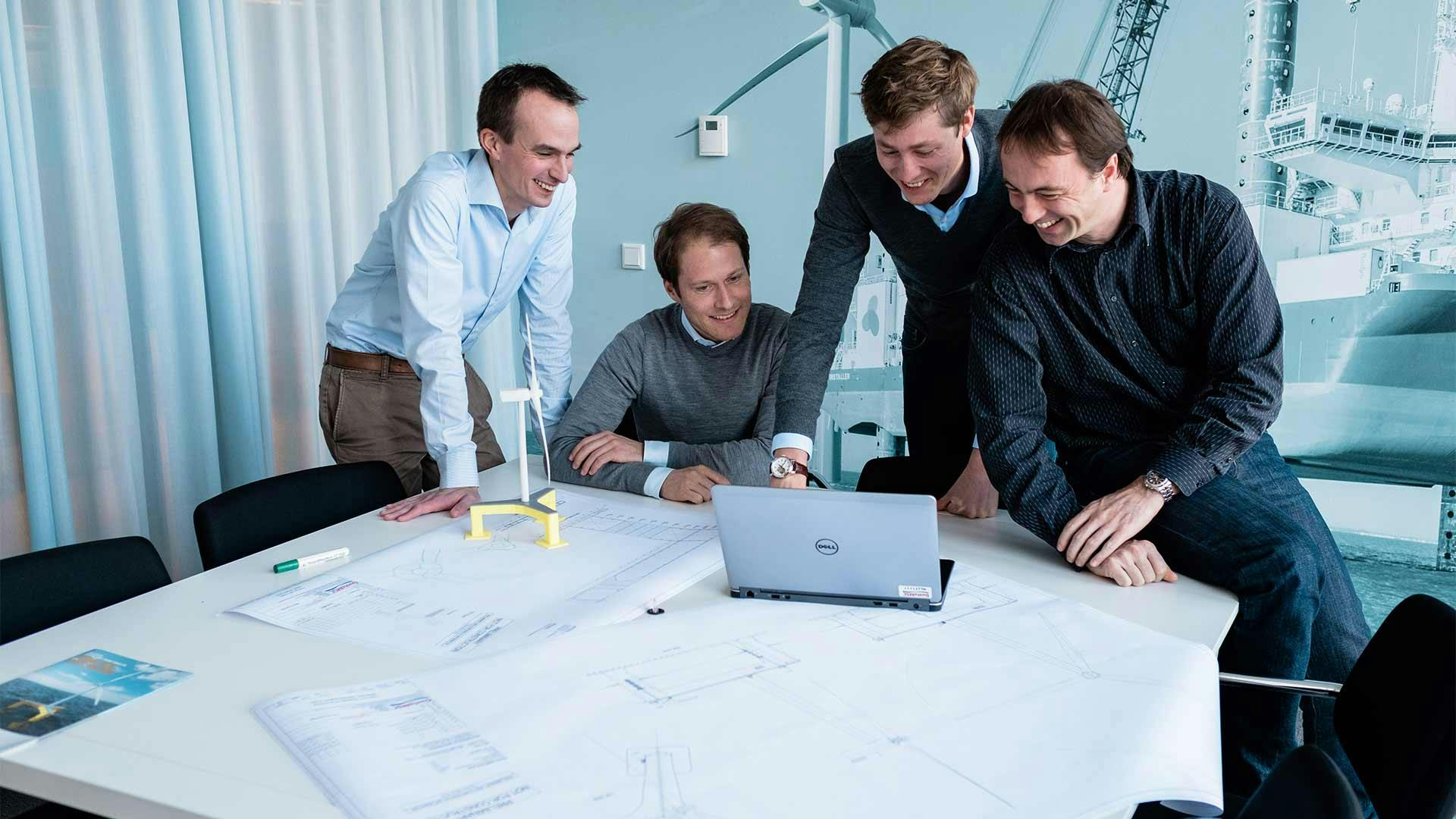 Senior Expert Engineer, Fons and colleagues reviewing designs for floating windmill platforms at GustoMSC office in Schiedam, The Netherlands