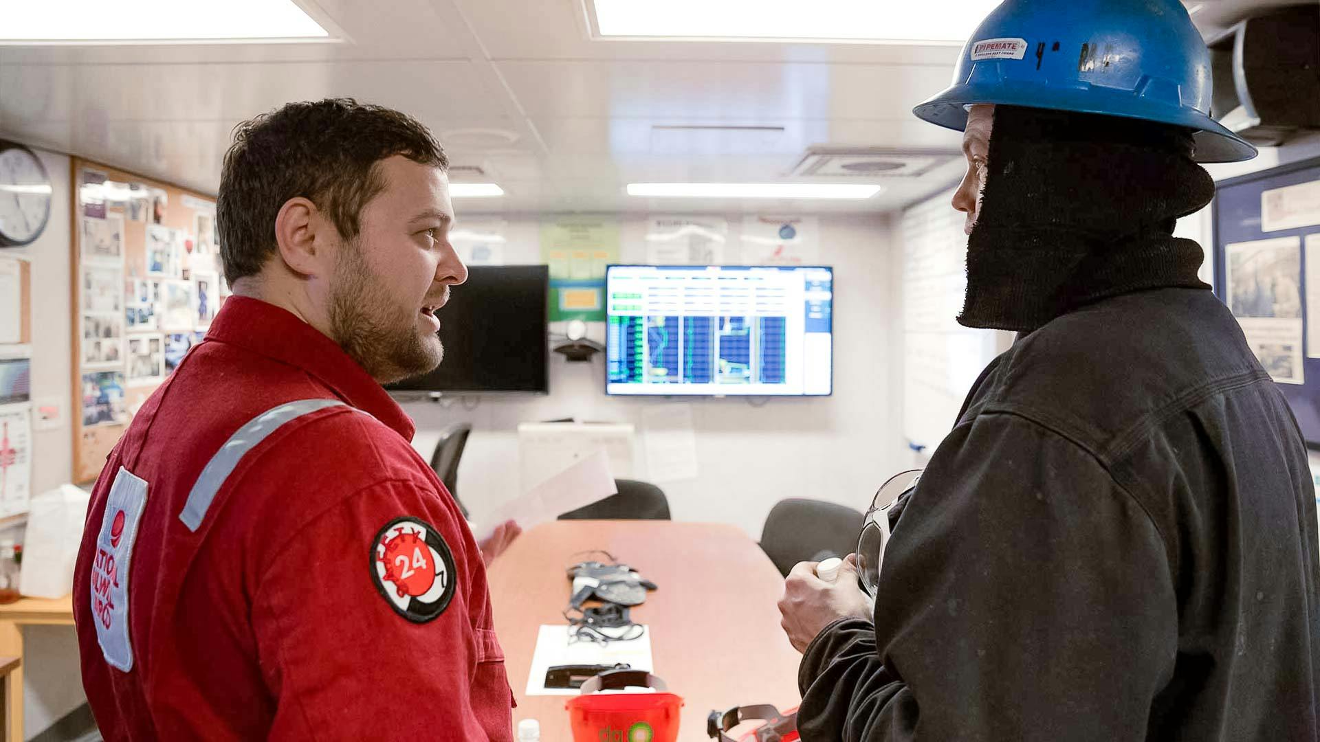 Jeremy meeting with Parker Drilling driller aboard rig 272, operating in Prudhoe Bay, on the North Slope of Alaska