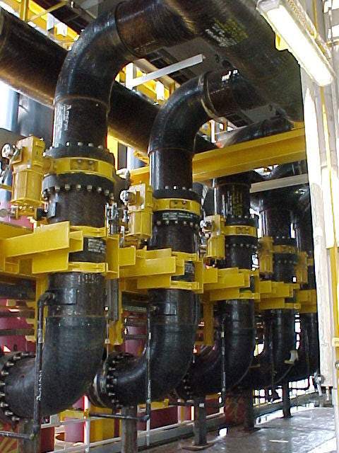 Large black and yellow Bondstrand GRE piping systems