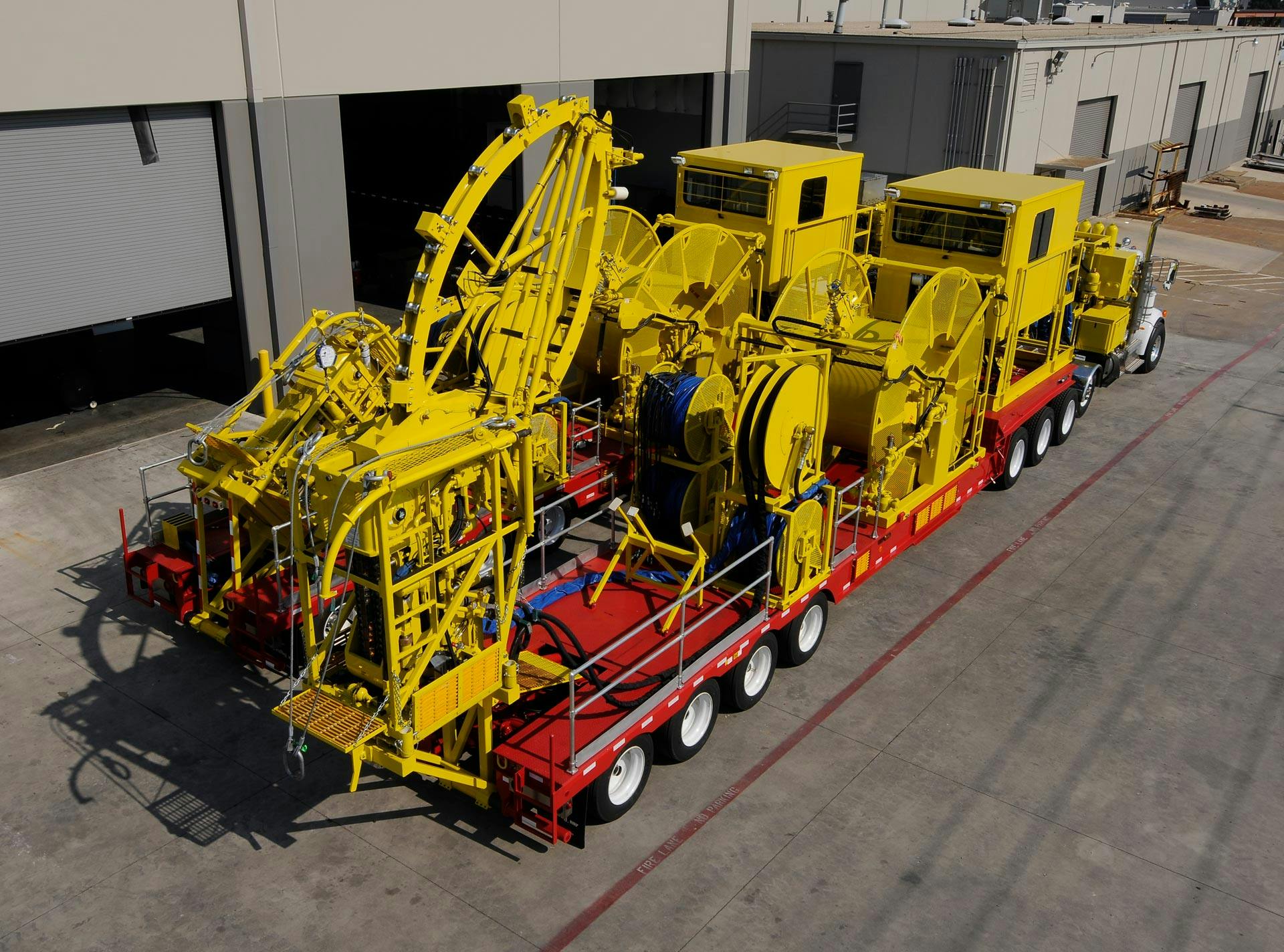 Two side-by-side Trailer-Mounted Coiled Tubing Units