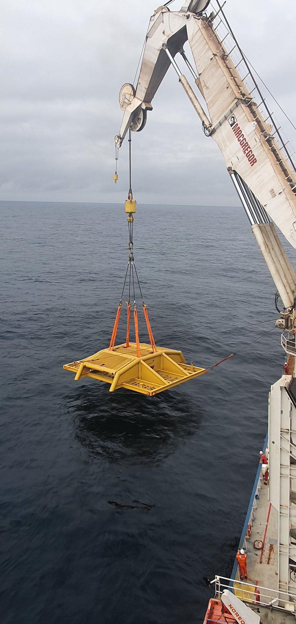 Deployment of subsea manifold just before entering the water