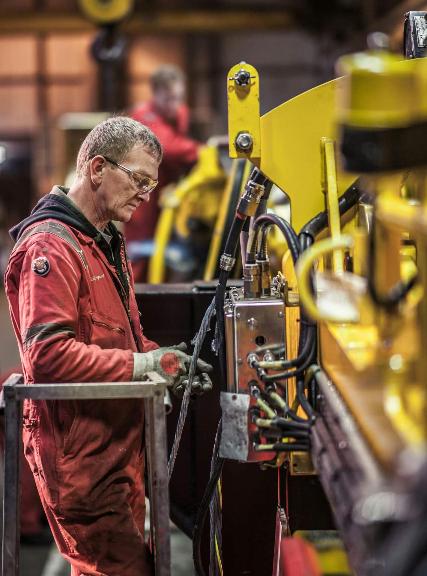 Service and repair technician in our service center working on drilling equipment