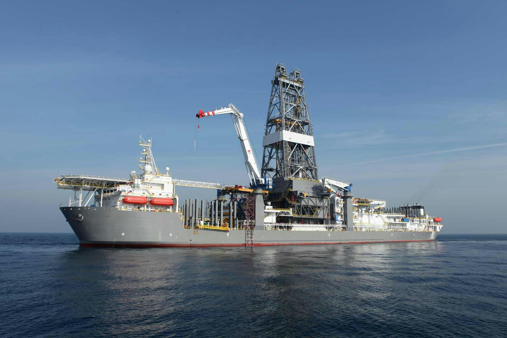 Offshore drillship derrick in the ocean