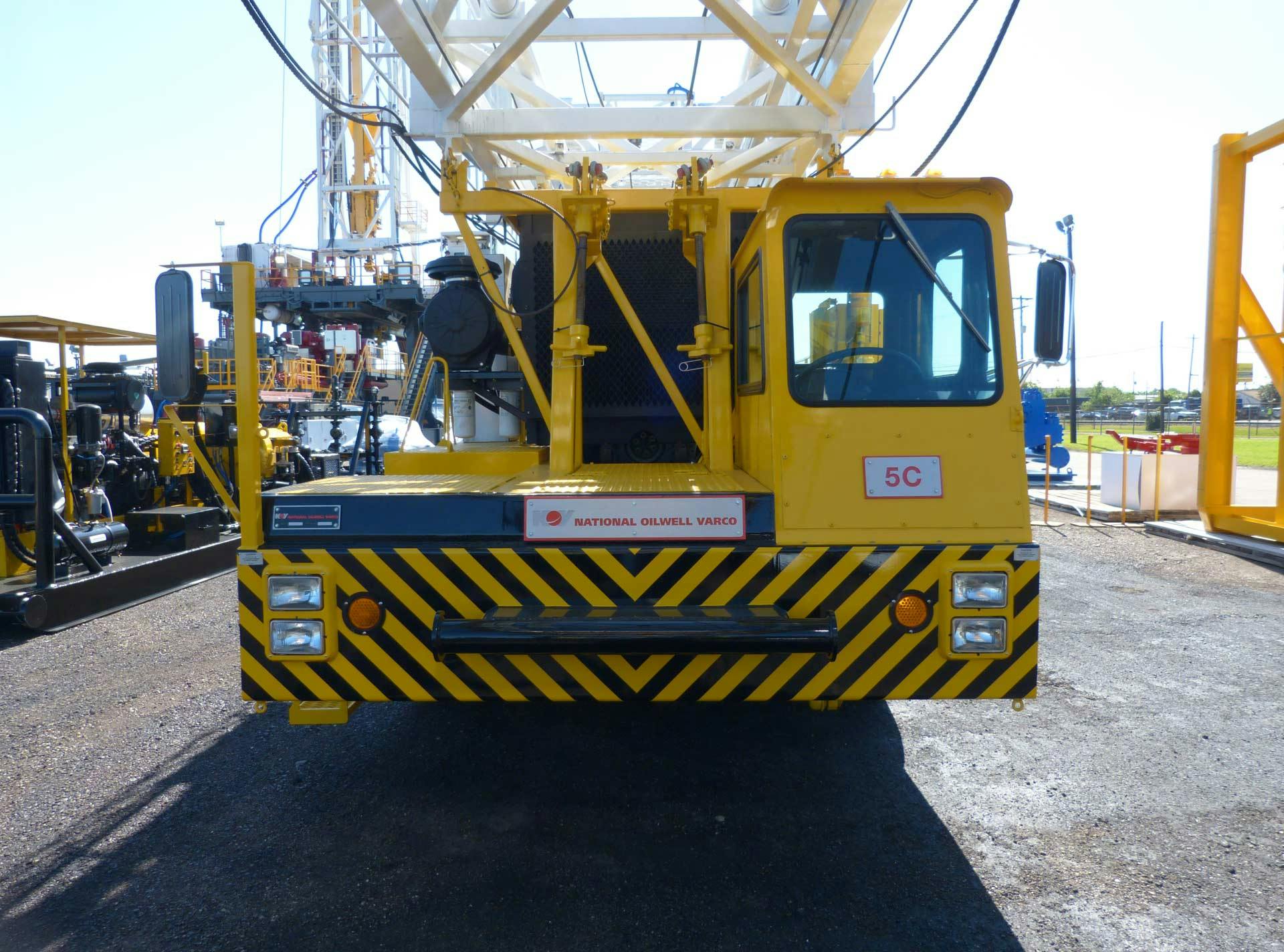 Front view of yellow mobile rig