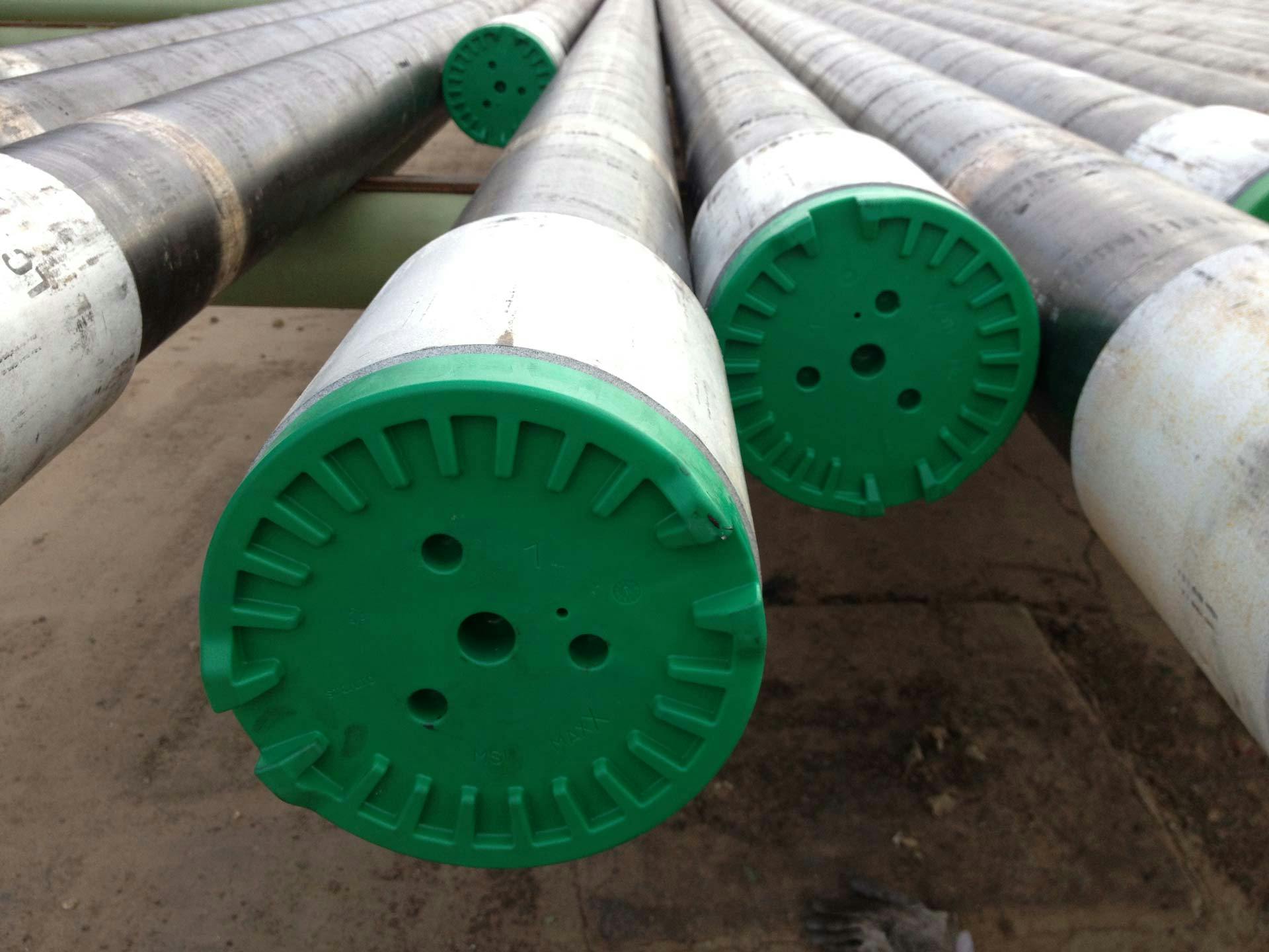 MaxX Tubing and Casing Thread Protectors on pipe