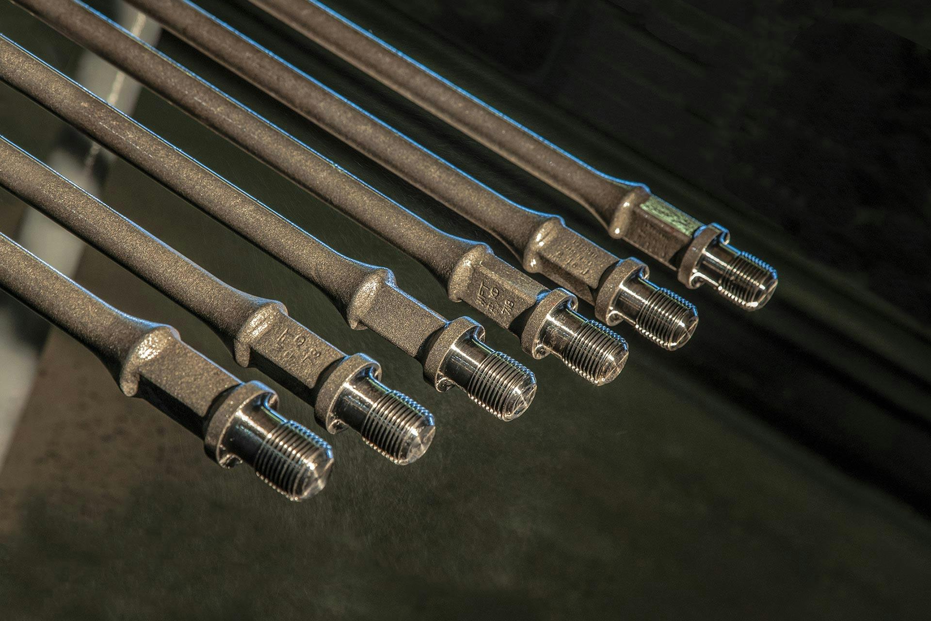 Sucker rods coated with spray metal for corrosion control