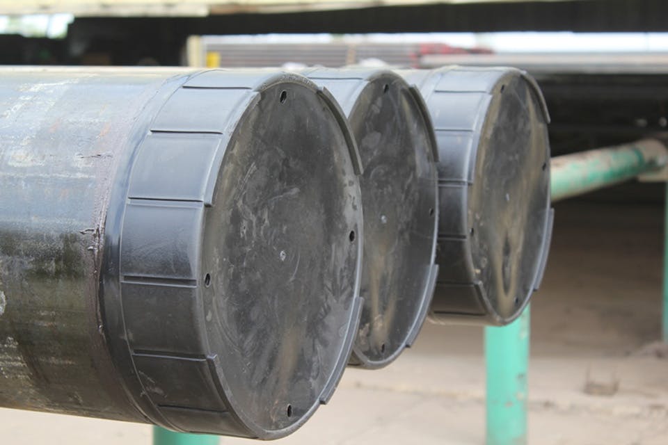 Close up of Tector Tubing and Casing Protectors in a line