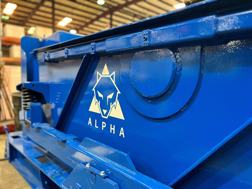 Upclose shot of the Alpha decal on an Alpha Shaker in a facility