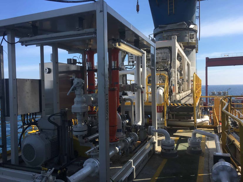 Image of machinery on a deep sea rig, with horizon in the background