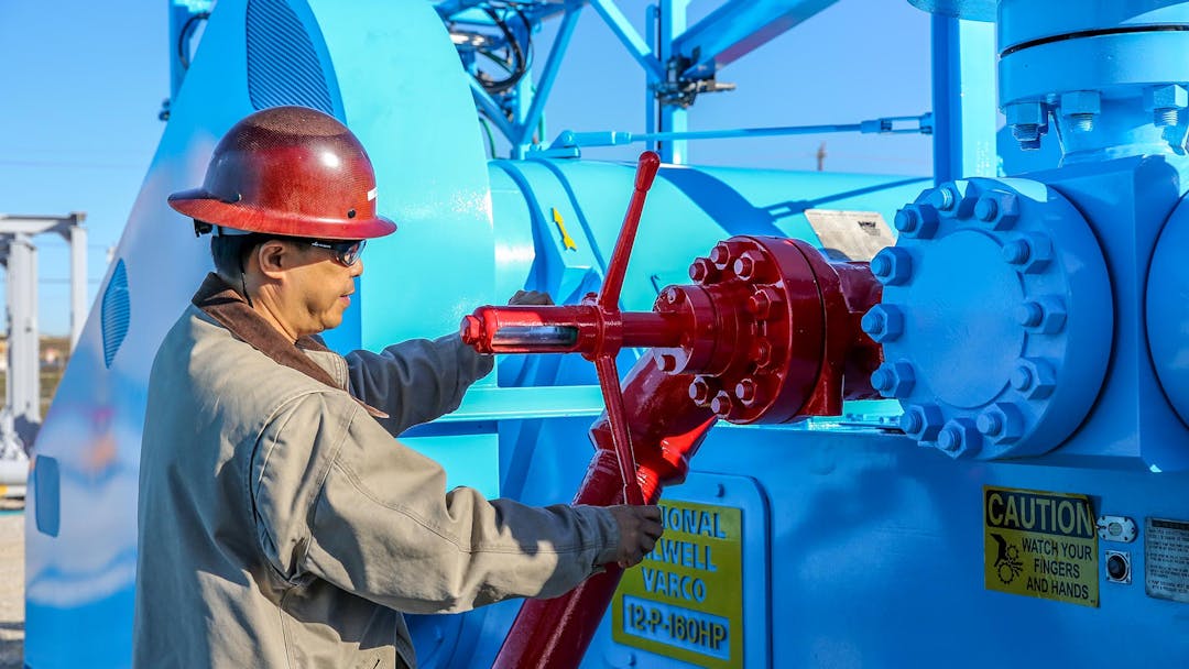 Technician working with drilling fluid end expendables